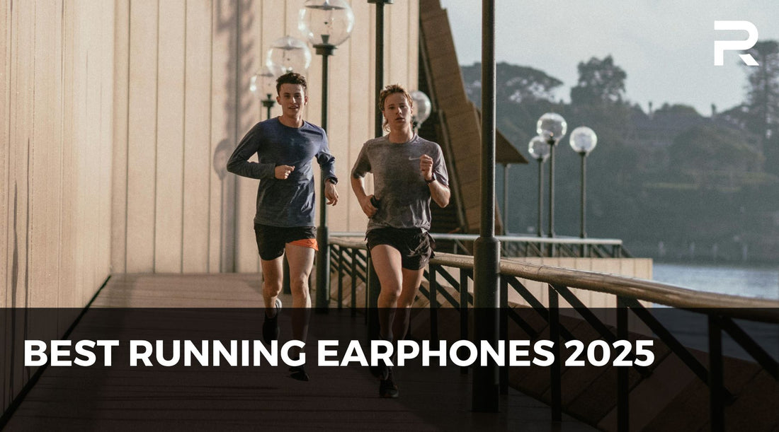 Two runners wearing athletic clothing jogging outdoors along a city path, illustrating the Best Running Earphones 2025 guide by RunBuds