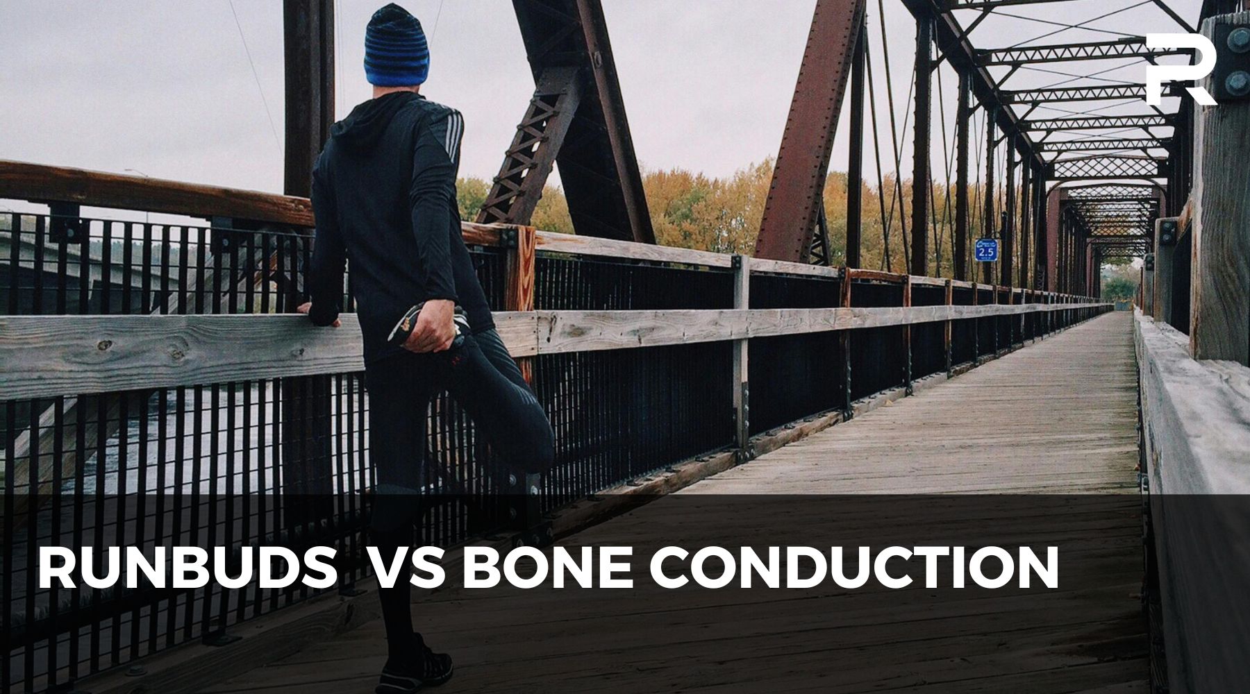 Runner stretching on a wooden bridge before a run, wearing sports gear, with "RunBuds vs Bone Conduction" text overlay – representing a comparison of earphones for running